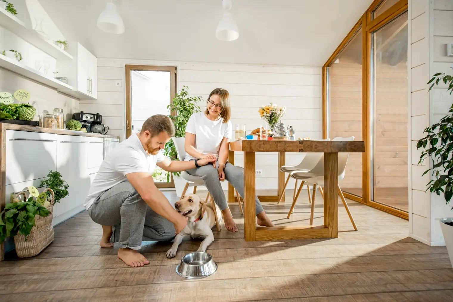 A happy family of ABC Plumbing customers in their home. 