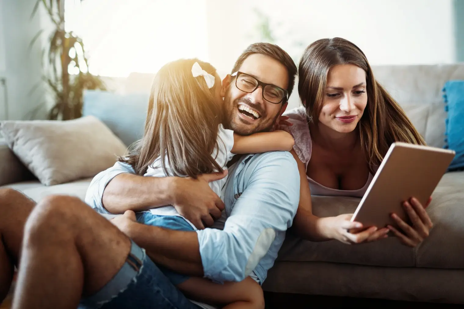 Family happy in the home following an AC tune-up