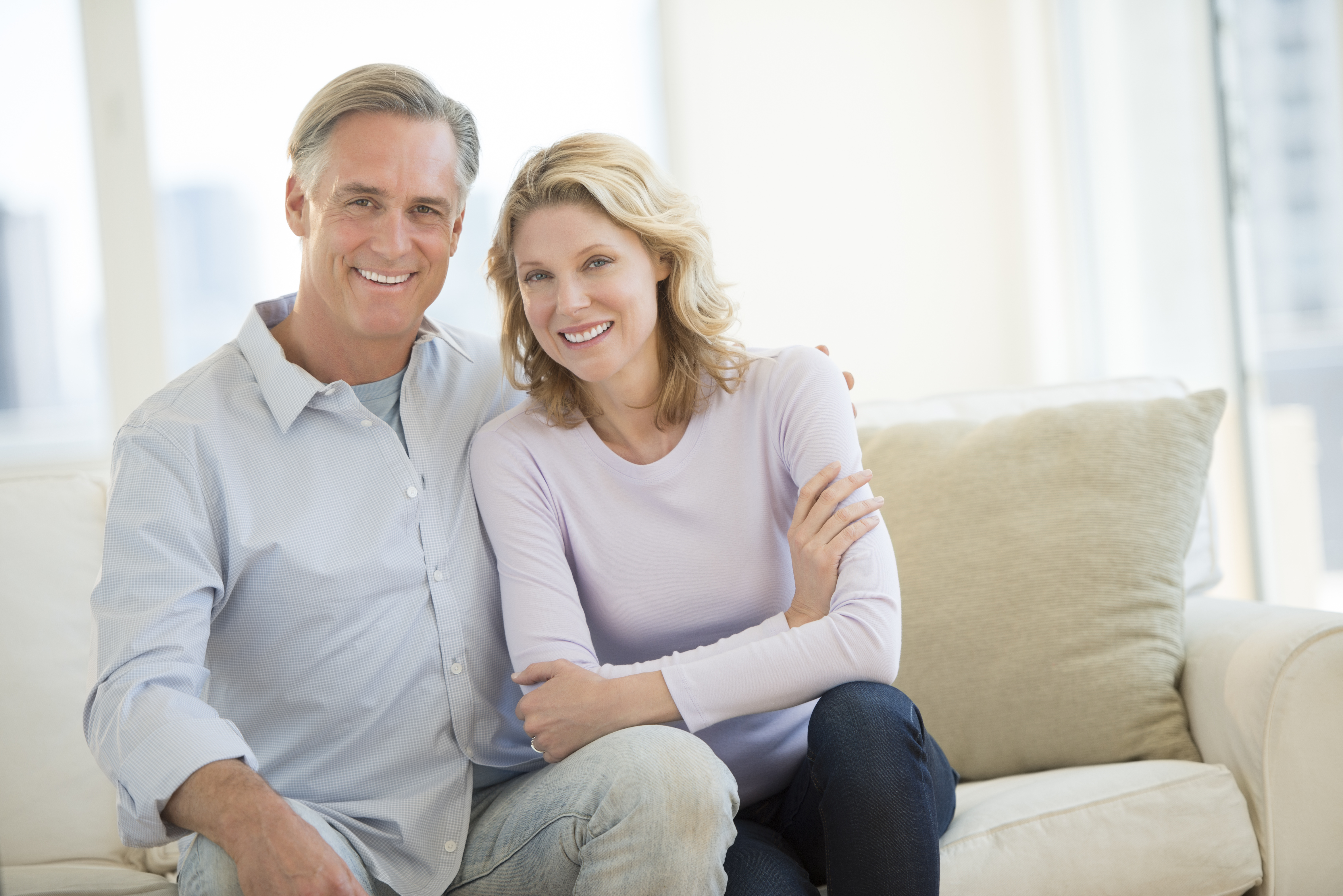 A satisfied couple after calling ABC Plumbing to fix their water shut off valve issue in their home.
