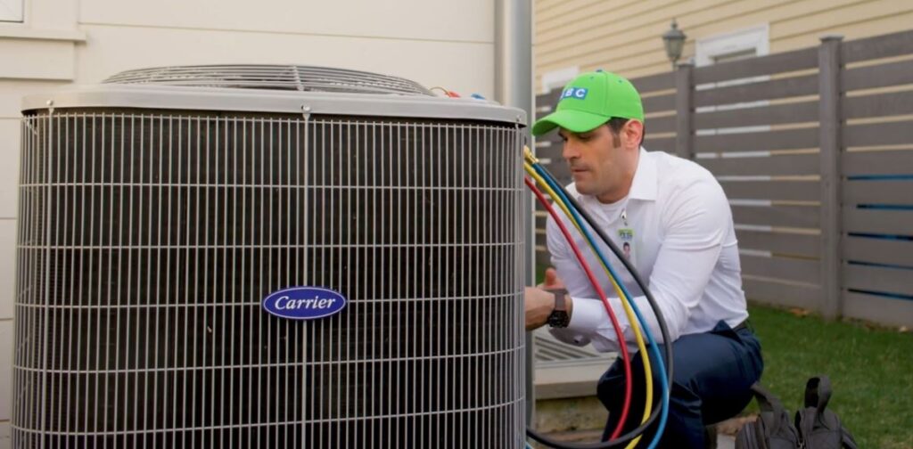 ABC technician working on A/C unit
